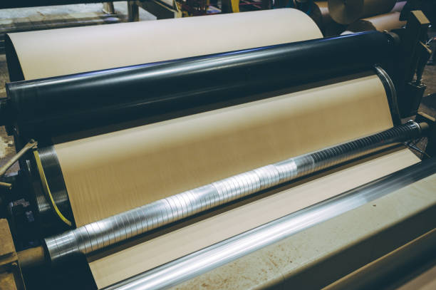 istock paper carton making factory machine huge cellulose 1187566649