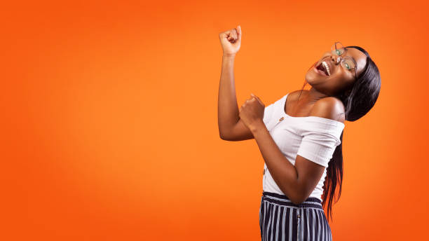 istock Happy Young Woman Gesturing Yes Standing In Studio, Panorama 1187568773
