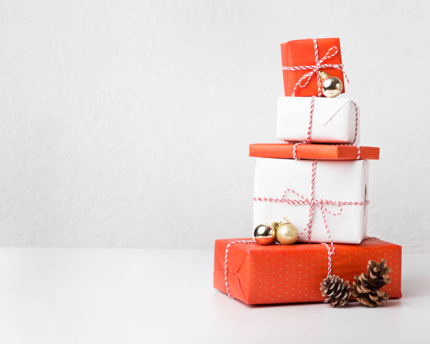 istock Collection of Christmas presents with cones on white 1187572294