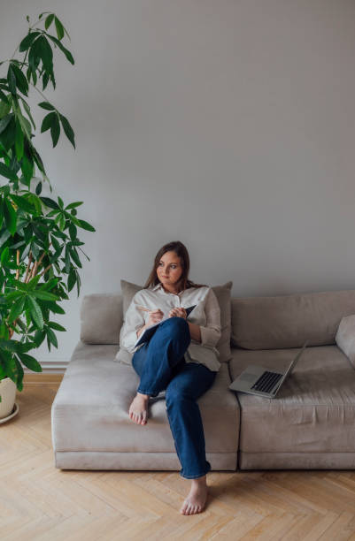 istock Young Woman Working at Home 1187574736