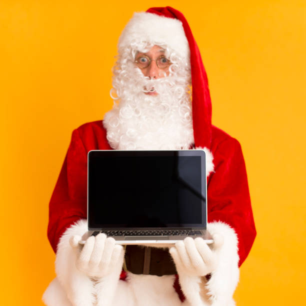 istock Christmas promo for modern laptop with black screen 1187574848