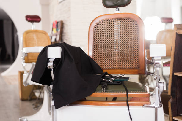 istock Barbershop chair with professional tools 1187575636