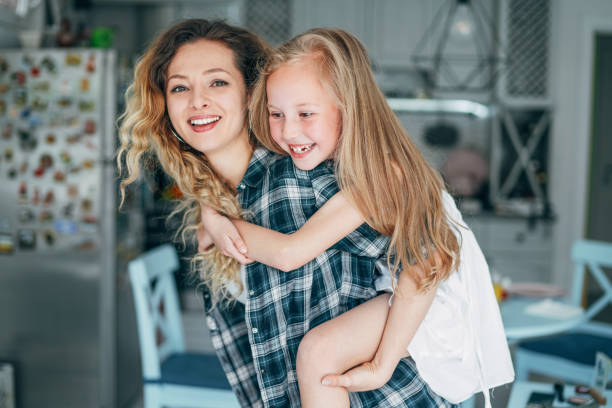 istock Mother and daughter happy together 1187575864