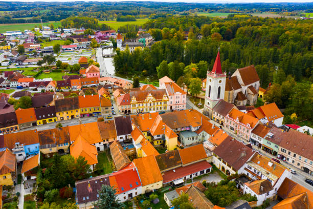 istock Blatna downtown with gothic Bell Tower and Water castle 1187575943