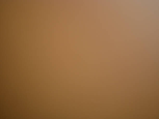 istock brown background with different illumination and fill 1187576233