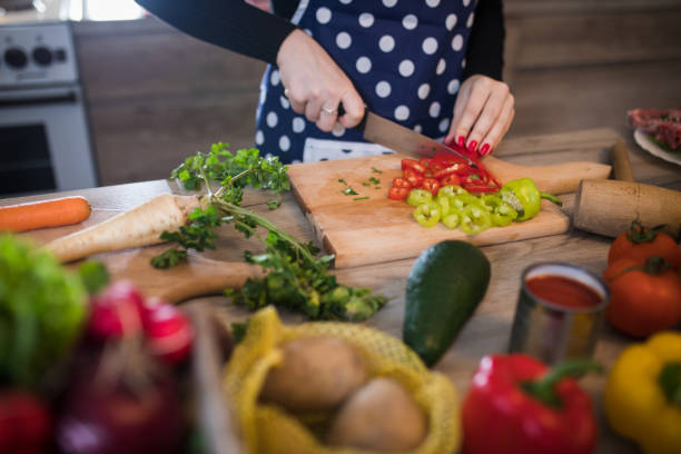 istock Young Woman Cooking in the kitchen. 1187577434