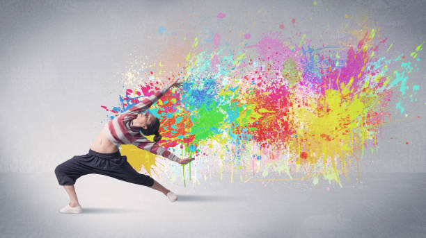 istock Young colorful street dancer with paint splash 1187577610