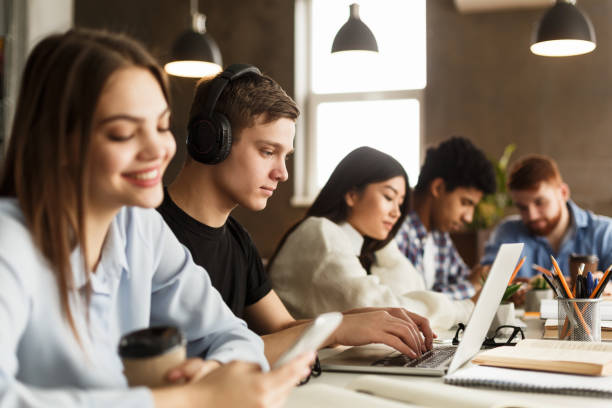 istock Education concept. College students studying in campus library 1187578745