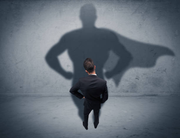 istock Successful businessman with superhero shadow 1187580629