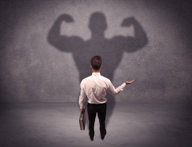 istock Successful businessman with strong shadow 1187580710