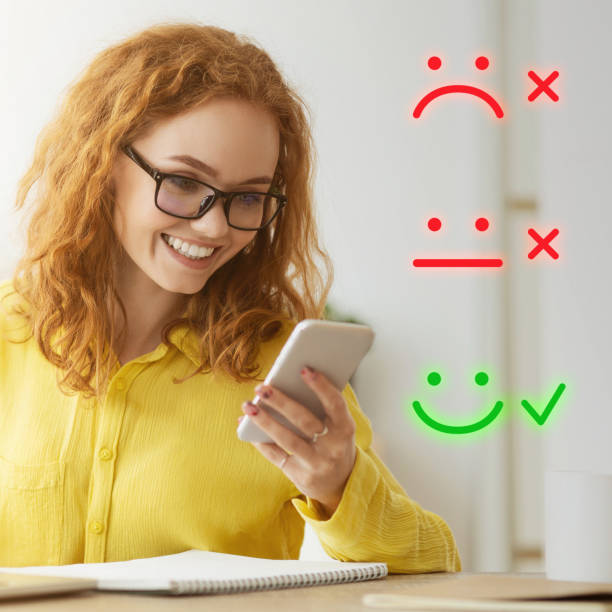 istock Red-haired woman giving high marks for service 1187580726