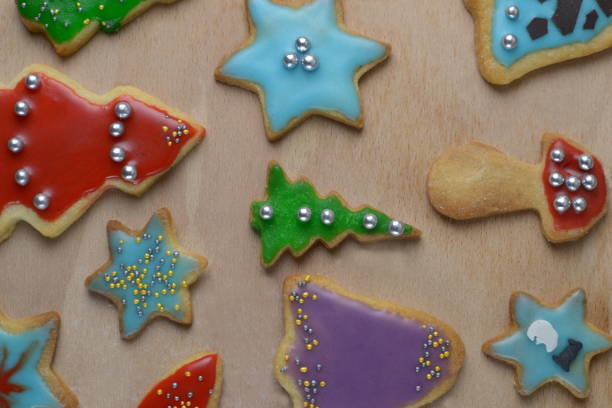 istock Christmas cookies on bright wooden background 1187580937