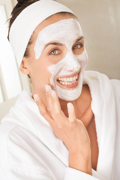 istock woman applying a beauty mask 1187582458