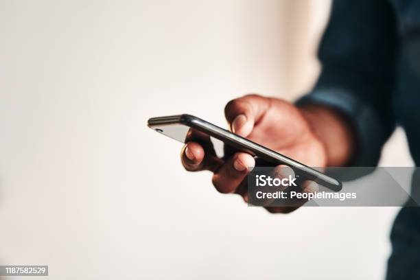 Staying Connected In This Digital Age Stock Photo - Download Image Now - Hand, Smart Phone, Holding