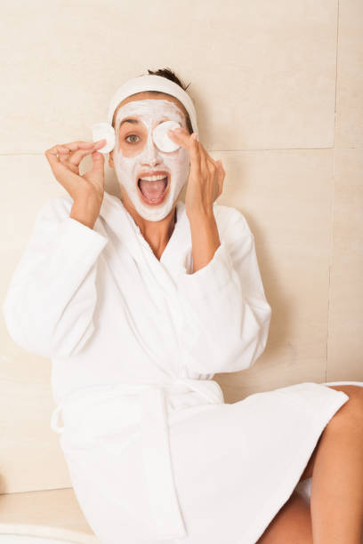 istock woman applying a beauty mask 1187583434