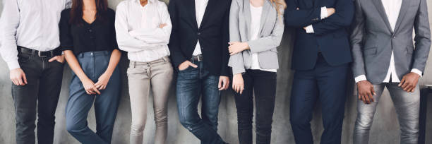istock Unrecognizable business team posing to camera, panorama 1187583638