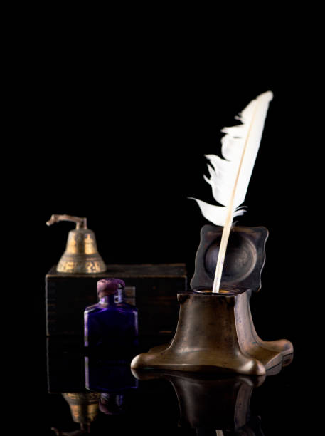 istock Still life with Ancient Inkwell, feather pen, ink bottle and a vintage bell 1187584580