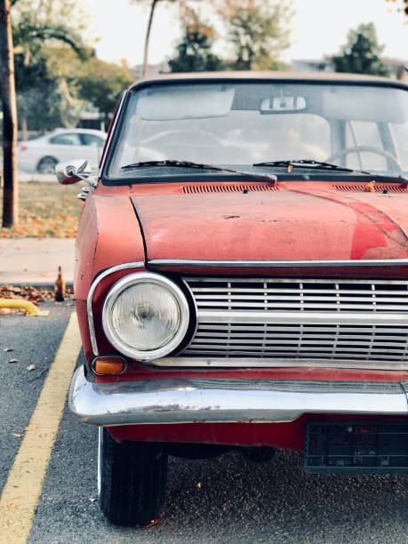 istock Old Car in the Car Park with Natural Daylight 1187584749