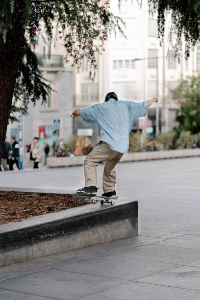 istock Man Skateboarding In The City 1187586450