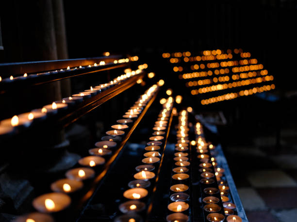 istock Many burning candles with shallow depth of field 1187589260