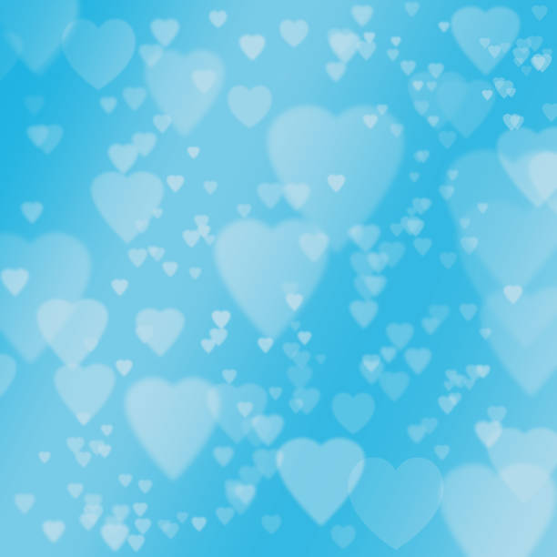istock Hearts blue with bokeh on white background 1187589822