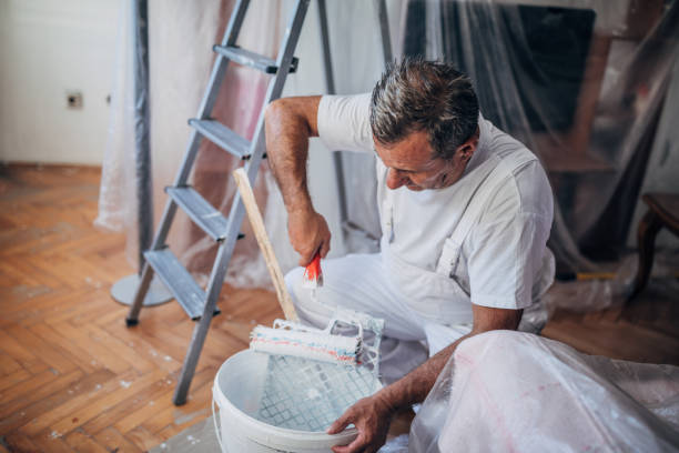 istock Senior man renovating home 1187590596