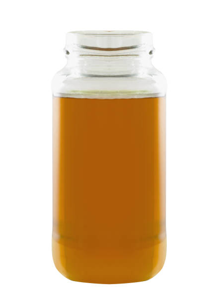 istock honey in a jar isolated on white 1187596209