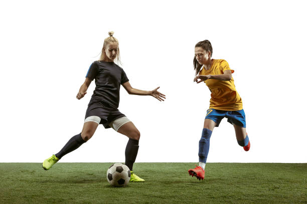 istock Female soccer players practicing and training at the stadium 1187600887