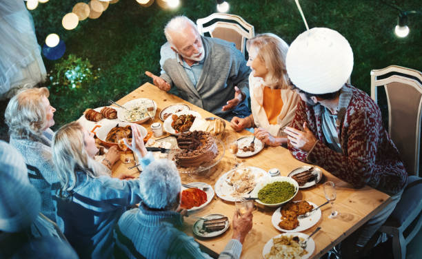 istock Family having Thanksgiving dinner. 1187603230
