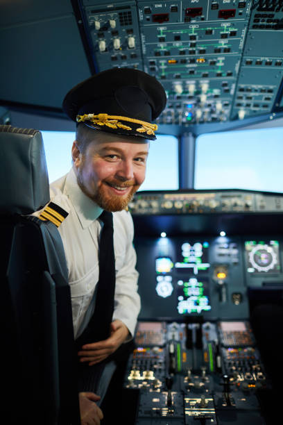 istock Cheerful airplane captain 1187603925