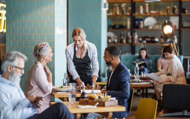 istock Business People on a Lunch Break at a Cafeteria 1187611401