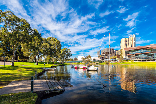 Adelaide, Australia - August 4, 2019: City center skyline view with new SkyCity Casino under construction in the middle viewed across Riverbank on a day