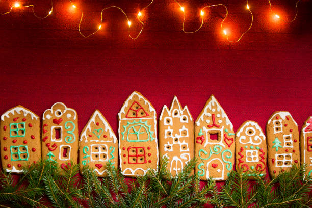 istock Red table cloth with town of cute gingerbread 1187615140
