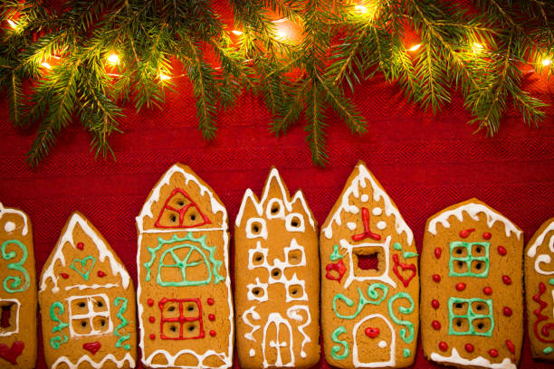 istock Red table cloth with town of cute gingerbread 1187615355