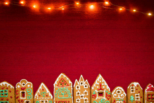 istock Red table cloth with town of cute gingerbread 1187615838
