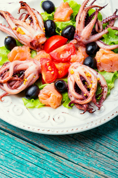 istock Salad with squid and seafood 1187616496