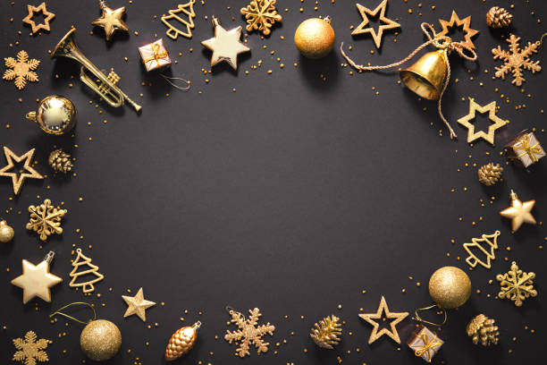 istock Christmas golden decoration on dark background 1187616632