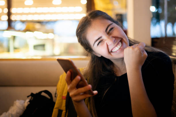 istock Young woman using smart phone 1187621890