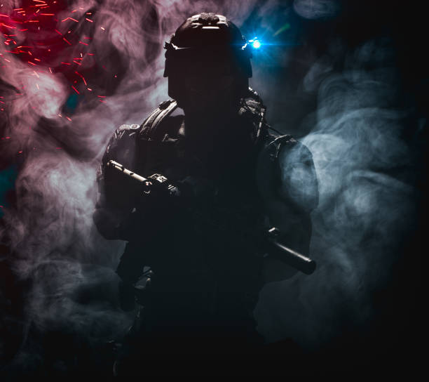 Shadow (silhouette) of a mysterious military soldier stock photo