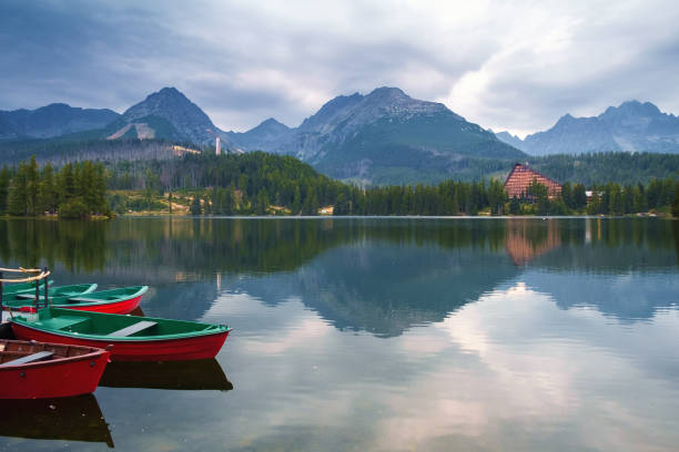 Strbske pleso mountain lake, Slovakia Strbske pleso mountain lake in autumn, in National Park High Tatra, Slovakia pleso stock pictures, royalty-free photos & images