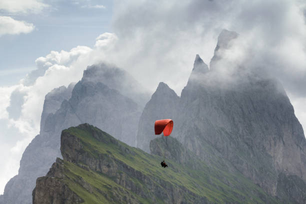 Mountain peak and lofty clouds behind