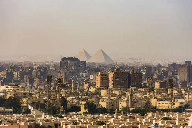 Cityscape panoramic of Cairo, Egypt, with the pyramida of Giza