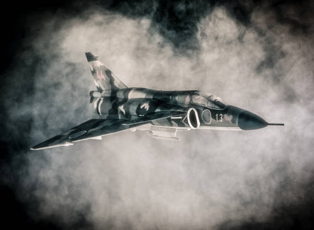 istock Military warplanes flying in the clouds 1187631658