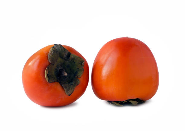 istock Ripe orange persimmon fruit isolated on white background 1187632869