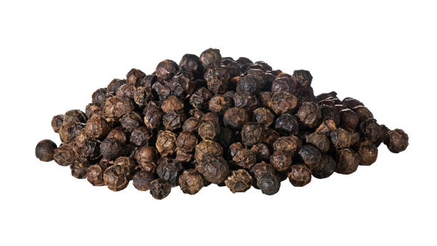 Black pepper pile of black peppercorns black peppercorn photos stock pictures, royalty-free photos & images