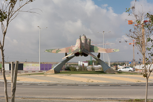 Military Army monuments at urban civil space, city view, Army fighter jet