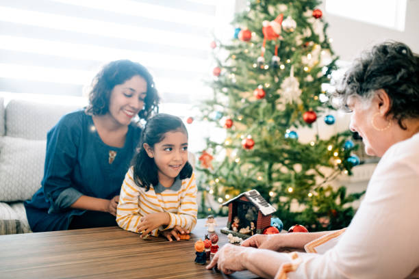 istock Children preparing Nativity with Grandmother 1187636227