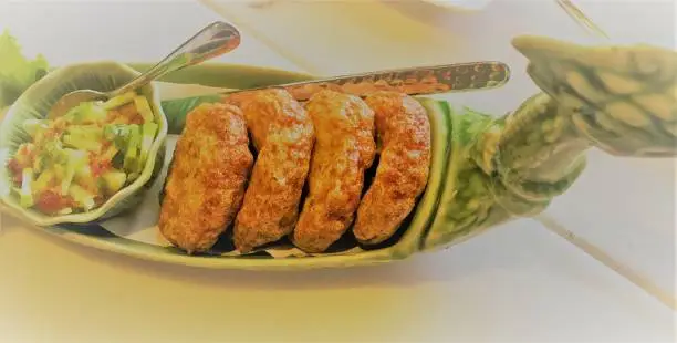 Photo of fried Fish Cake  on dish.Fish Cake (Tod Mun Pla).thai cuisine