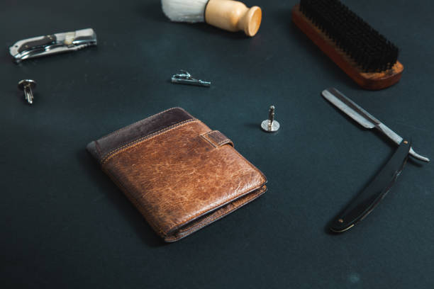 istock wallet with man accessories on desk 1187637554
