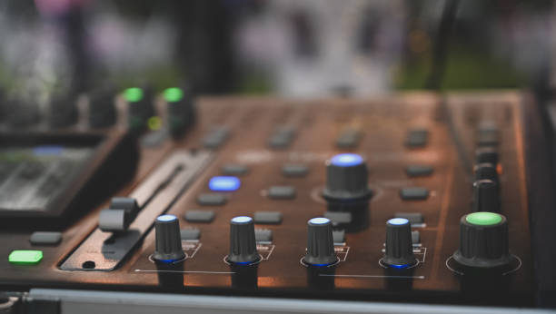 istock Audio sound mixer console with night time. 1187639982